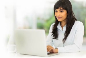 indian businesswoman using computer